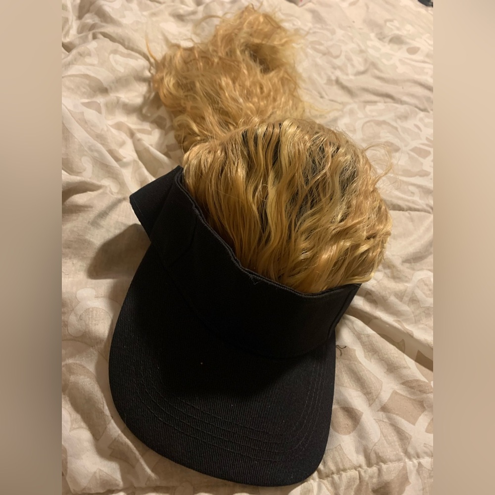 Just purchased and I’m not a blonde! Never worn. Visor with built in hair